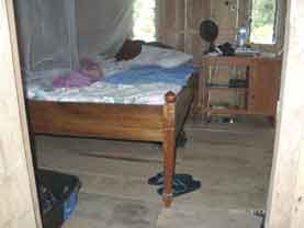 Bedroom in a cheap hut